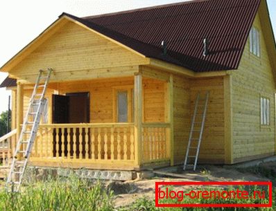 На фотографијата - куќа со поткровје од бар 9х9 На фотографијата - куќа со поткровје од бар 9х9